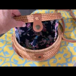 Woven Crossbody bag with leather strap.